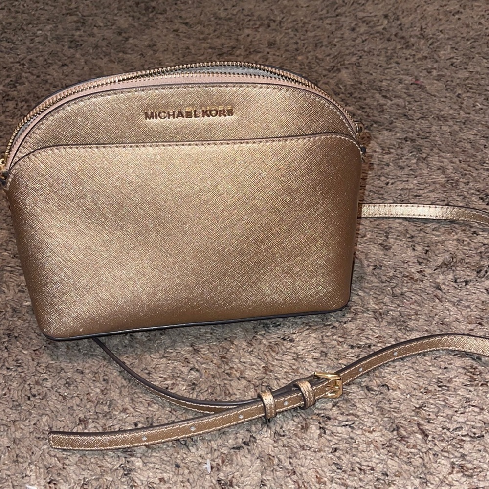 Rose gold Michael kors purse